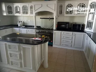  14 Mayed kitchen cabinet for sale