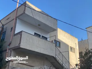  1 شقة ومخازن للبيع