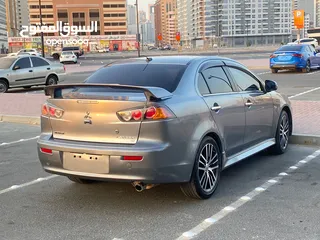  4 2016 Mitsubishi Lancer GT. Excellent conditions beautiful car for sale in Dubai. Al Nadha.