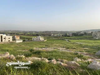  1 قطعة أرض دنم سكن أ طريق المطار خلف جامعة الزيتونة