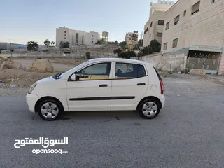  3 كيا بيكانتو 2006 لون ابيض (اتوماتيك)