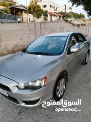  4 متسوبيشي لانسر موديل 2016 ممشى قليل للبيع بسعر مناسب