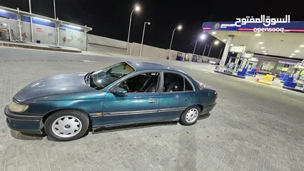  19 اوبل اوميجا للبيع السياره ب حاجه ل صيانه (القير + صنوبرصات) كاوشك جديد كراسي كهرباء السياره فحص خالي