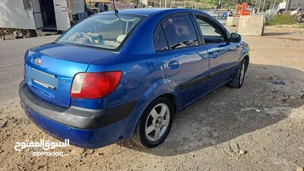  2 كيا برايد 2009 اوتومات 4+1 بنزين اصل خصوصي 1600 مع فتحة سقف اصلية