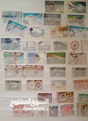  14 طوابع اصلية من كل بلدان العالم للبيع المستعجل الطابع ب دينار