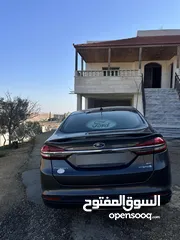  1 فورد فيوجن 2017 سبورت بكج 7 جيد  مع فتحه سقف بسعر حرق