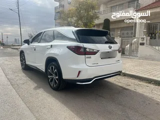  4 لكزس RX450hL موديل 2018 لون ابيض لؤلؤي وارد وصيانه الوكاله اعلى تصنيف من فئتها