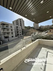  6 شقتان فاخرتان للبيع في الأردن - الجبيهة مع اطلالة خلابة. بناية على 3 شوارع منطقة فلل