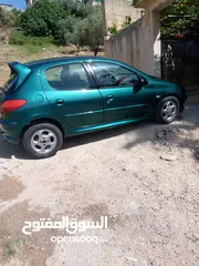  12 بيجو 206 موديل 2002