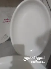  11 صحون فندقية مختلفة الاحجام لون أبيض ميلامين انيقة وفخمة غير قابل زينى بھا سفرتك برمضان