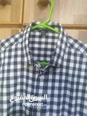  25 قمصان رجالي و وولادي جميع المقاسات ماركة زارا وبولو بأسعار مخفضة القميص ب دينارين