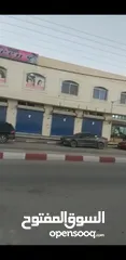  9 محلات تجارية وشقق للايجار في سوق مغير السرحان موقع مميز