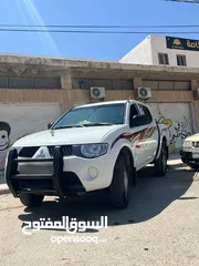  3 l200 موديل  2009 فحص كامل مالك ثاني من الحره ماشيه 226 الف