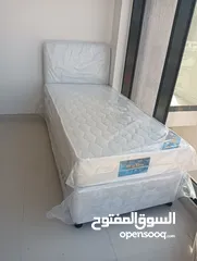  1 l am selling brand new single American base bed with spring mattress