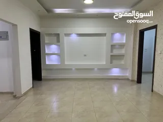  2 شقة طابقية (طابق رابع) 185 متر للبيع مادبا - حنينا  صالون وترس واسع