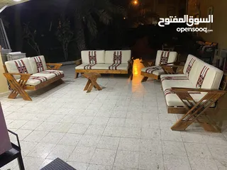  4 للبيع طقم خشب خارجي 9 اشخاص شبه جديد صناعه سعوديه