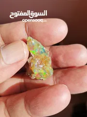  1 حجركريم اوبال ملتي كلر ناري Opal gemstone