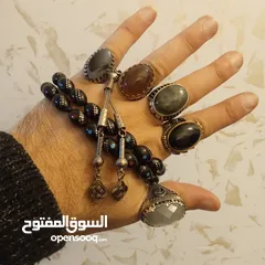  4 خواتم فضه مطعمه بالحجر الكريم