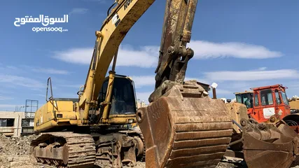  4 حفارة كوماتسو 380-6 موديل 2000 تب نظافة و لودر كتربلر 970F للبيع