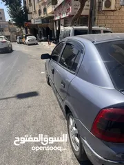  5 اوبل استرا 2004 مطور 16000 قير عادي