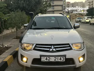  2 ميتسوبيشي L200 بنزين موديل 2015 وارد الشركة ممشى قليل 75 الف كم بحالة الوكالة