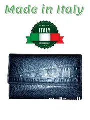  1 محفظة وحافظة نقود للسيدات جلد ايطالي  طبيعي اصلي مستعمل شيء بسيط بحالة ممتازة شبه جديدة.