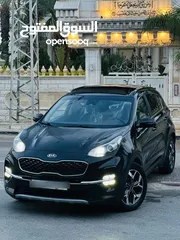  1 كيااا سبورتاج مطور 2000 بنزين 2*4 الجيب بالكراتين فل اضافات ملغم امكانية البيع نص بالنص الله يبارك