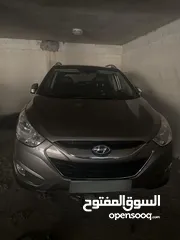  24 2009 ‏Hyundai توسان LX20 اربع ابواب، اللون فيراني، الكراسي جلد والسيارة 92,000 كيلو فقط وبحالة رائعة