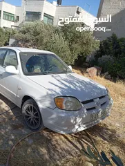  2 سيارة هونداي فيرنا 2003ميكانيكيات جيدة جدا وعيوب بسيطة بالبودي