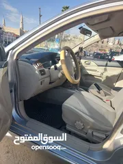  9 لانسر 2005 وارد الكويت 4 جيد ماتور 1600 الاصلي "الملا"