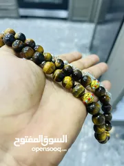  20 عرض خاص سبحه عين النمر ازرق او ذهبي بسعر حرق 33 حبة حلوة مش صغيرة للعلم مع طقم انتيومون مرتب
