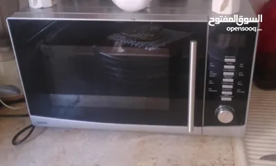  1 بيع المايكرويف سونا لون سلفر واسود