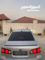  7 كيا لوتزي 2006 3 جيد لون سلفر ماتور 2000cc