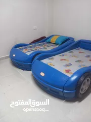  1 تخت اطفال سيارات بلاستيك