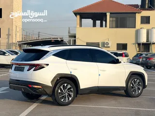  6 هونداي توسان /2022 فل الفل بدون فتحة سقف  2x4 ///240Hp بنزين + كهرباء  ( Haybrid) 1600cc