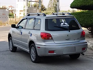  14 ميتسوبيشي آوتلاندر اوتوماتيك 2003 توب نظافة بسعرررر مميززز محرك 2400cc