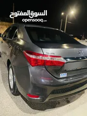  3 تويوتا كورولا موديل2015 فحص كامل لون فيراني مميزه   وغرفه بيج  مميزه جدا  فحص كامل 7 جيد ملاحظه السي
