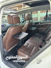  9 فوكس فاجن تيجوان 2012 بنزين متور 2000 تيربو 4x4 فتحة سقف بانوراما فرش بني مميز عداد قليل فحص ممتاز