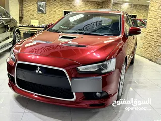  17 ميتسوبيشي لانسر موديل 2015 GT اصلي فحص كامل بحالة الوكاله فل كامل اعلى صنف من فئتها