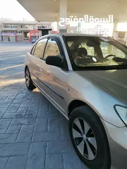  2 هوندا سيفيك 2004...للبيع او .....للبدل ع فورد cmax............
