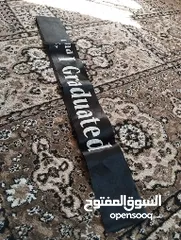  5 باجة تخرج سوداء بكتابة بلون ابيض I Graduated جديدة للبيع
