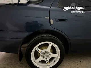  21 كيا سيفيا لون ازرق ميتالك نظيفه مع جنط 15 مميز كاوشوك وكاله غرفه نطيفه بطاريه جديده لسى كفالتها معها