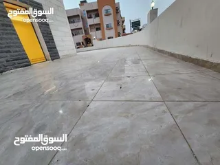  2 شقه ارضيه بناء جديد سوبر ديلوكس موقع مميز علي شارعيين