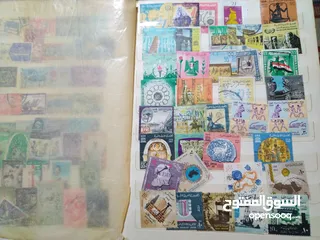  15 نيشان ملكى وزن41, 41 جرام من الدهب والفضه وعقدفضه من الاحجار الكريمه وطوابع قديمه نادره