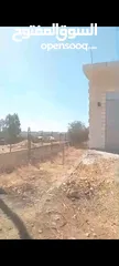  2 بيت مستقل مع محلين على الشارع اريسي. للبيع في بلعين