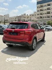  13 MG EHS ترخيص 2022  محرك 1500 هايبرد plug in/يقطع على الشحنه 52 كيلو متر