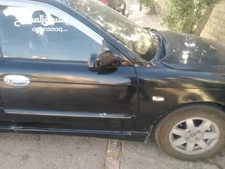  14 كيا سبكترا 2001 Mr لون اسود ملوكي بسعر مغري