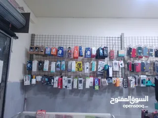  4 بضاعة محل إتصالات