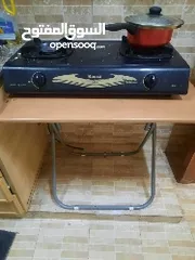  2 Gas stove along with table