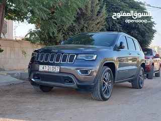  1 جيب جراند شيروكي فل الفل اعلى فئة بانوراما 2014 فحص كامل لون فيراني مميز بسعر مغري قابل للبدل والاقص